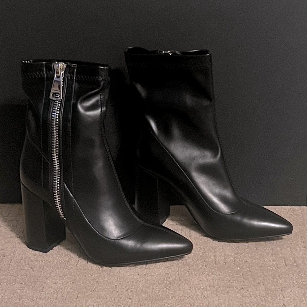 Brand new, in box black booties.